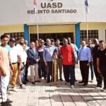 Maestro Juan Arias Fuentes Recibe la antorcha de los Juegos Tony Barreiro en UASD Recinto Santiago